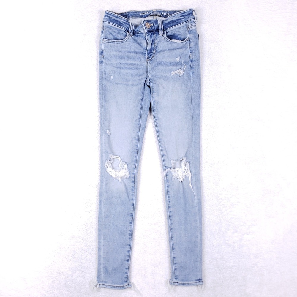 American‎ Eagle Distressed Step Hem Jeggings 25 Light Wash